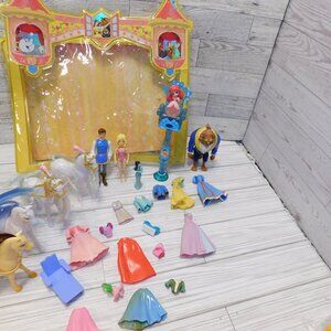 DISNEY MIXED POLY POCKET TOY AND CASE *